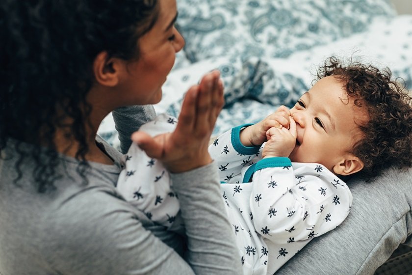 high angle view mother playing with son home